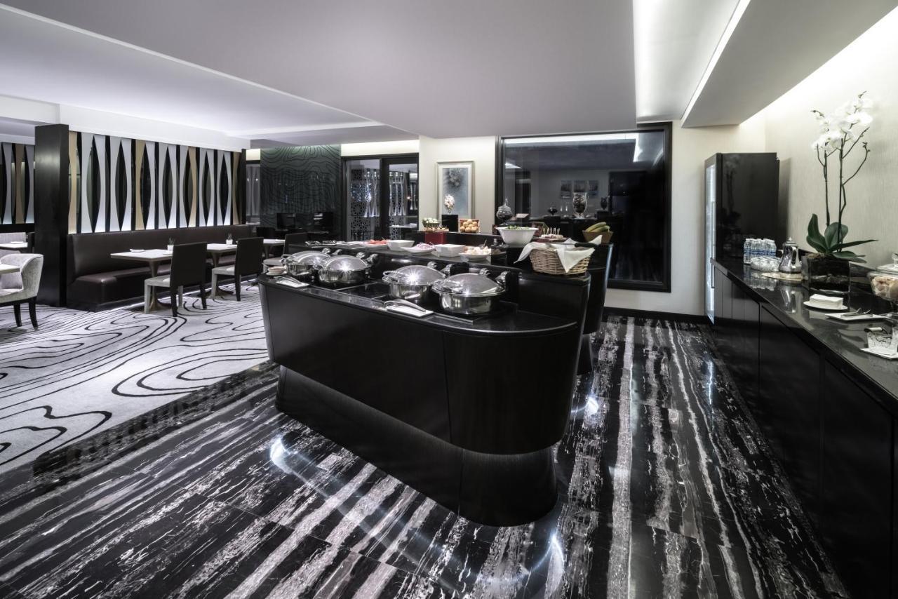 מלון Radisson Collection Muscat, Hormuz Grand מראה חיצוני תמונה The Club Lounge at the Four Seasons Hotel, Hong Kong